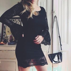 Black lace bodycon dress with bell sleeves